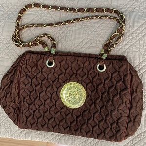 Unusual brown tufted fabric bag